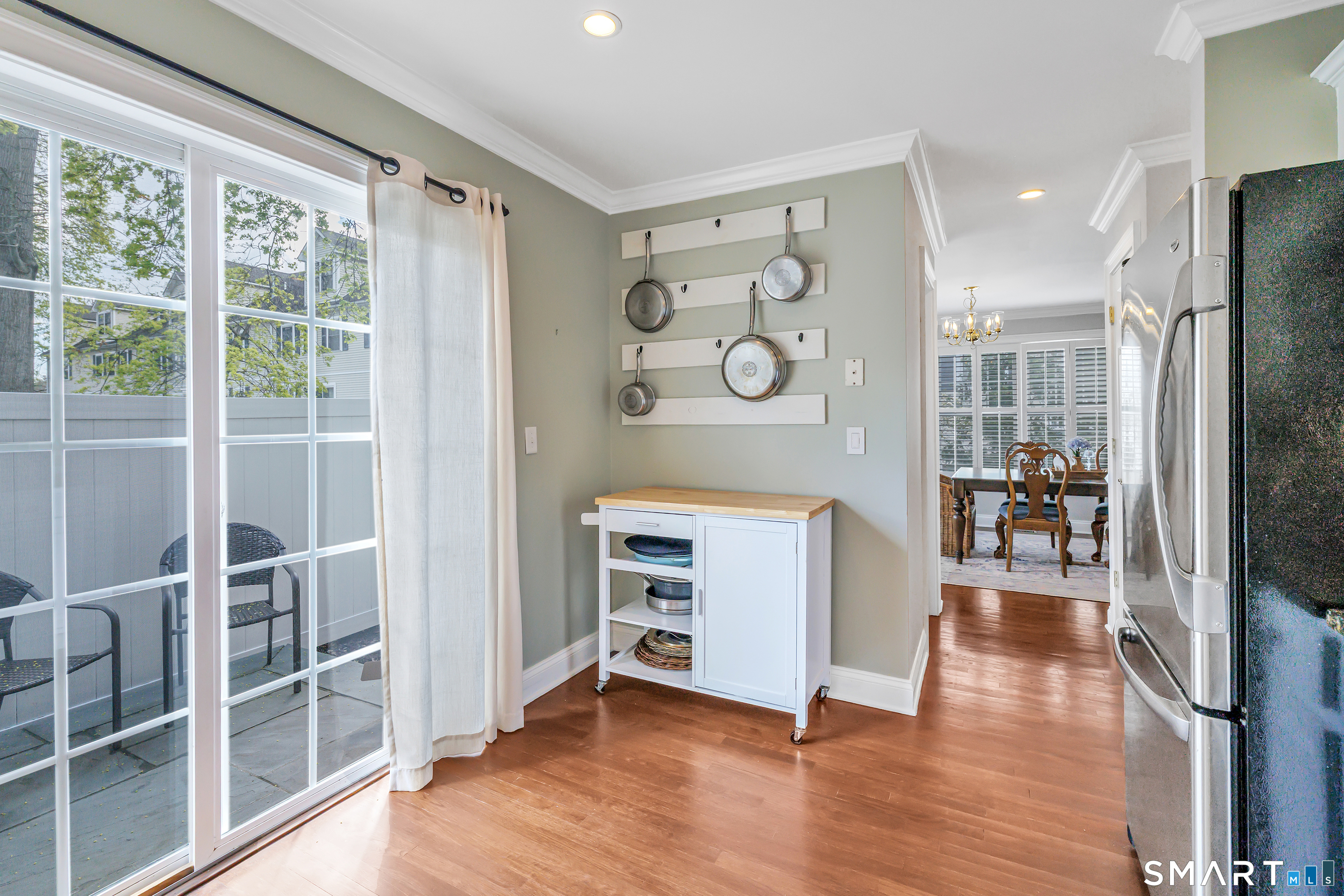 39 Maple Tree Avenue, Unit 15 Stamford, CT 06906 - Photo 9 of 32 a view of livingroom with furniture and wooden floor