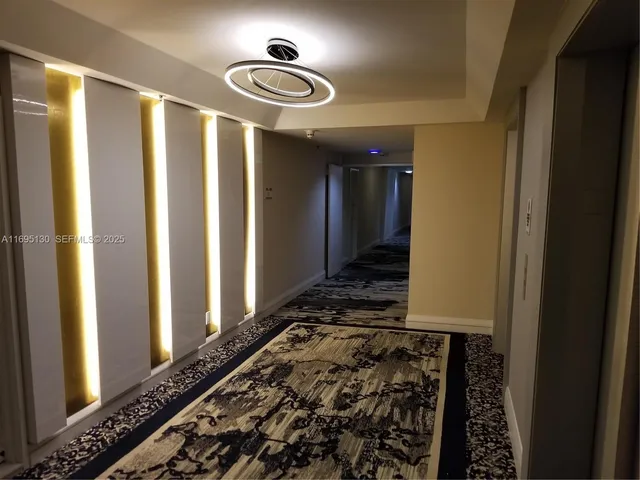 a kitchen with a stove and a microwave