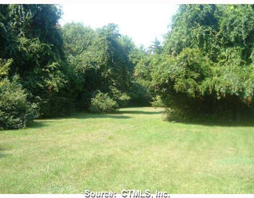 139 Scotland Road Madison, CT 06443 - Photo 1 of 1 a view of a green yard