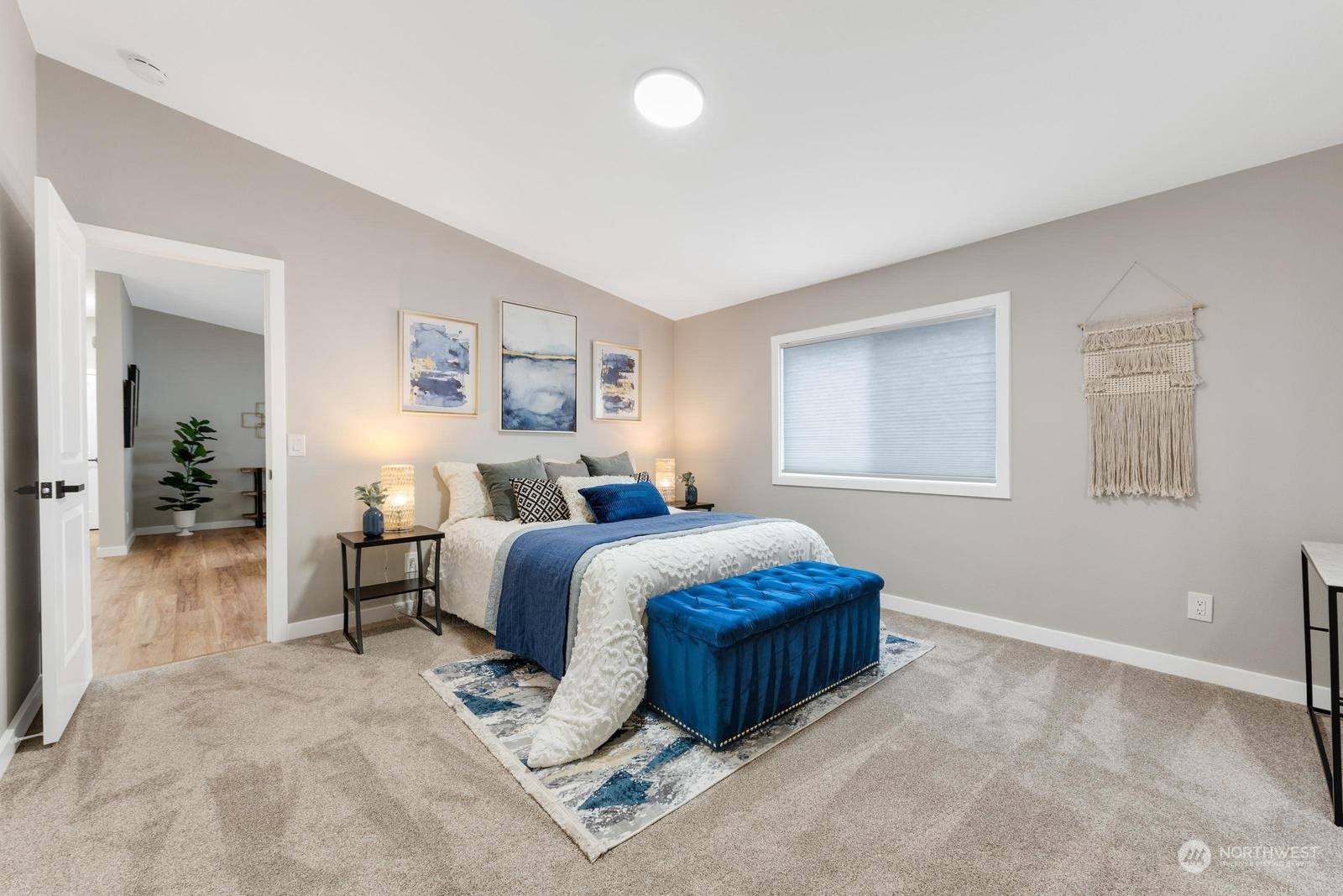 20500 32nd Drive Southeast Bothell, WA 98012 - Photo 13 of 28 a spacious bedroom with a bed and a cabinets