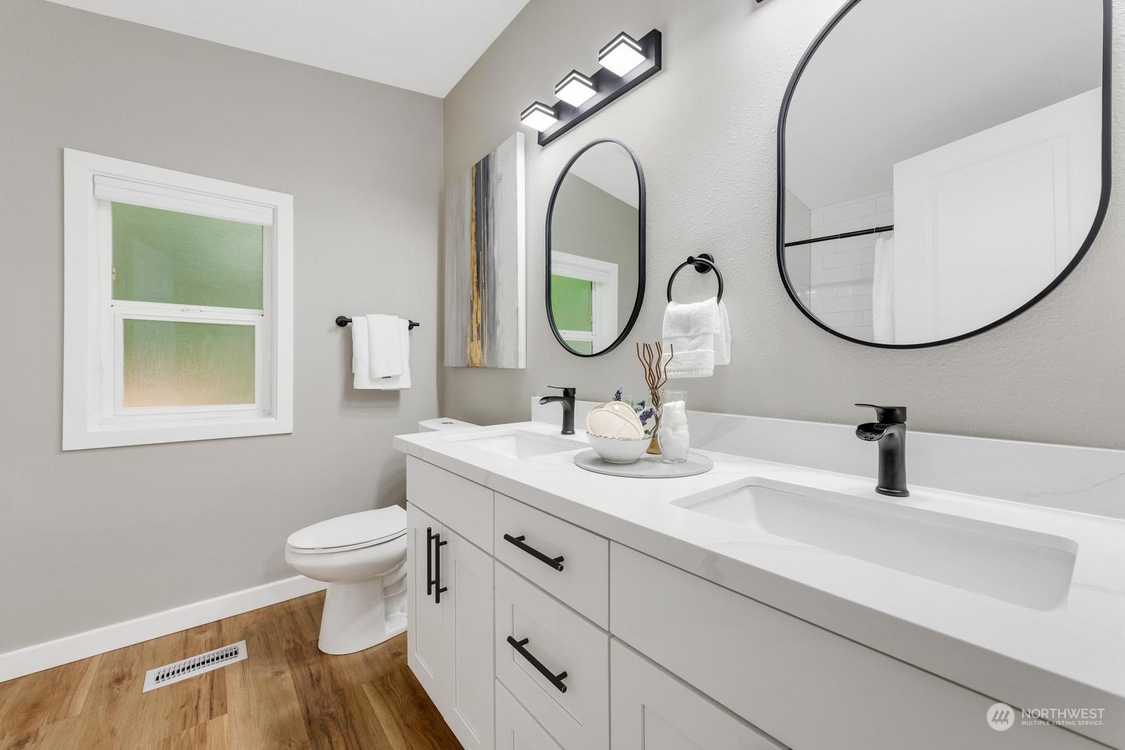 20500 32nd Drive Southeast Bothell, WA 98012 - Photo 15 of 28 a bathroom with a sink and a mirror