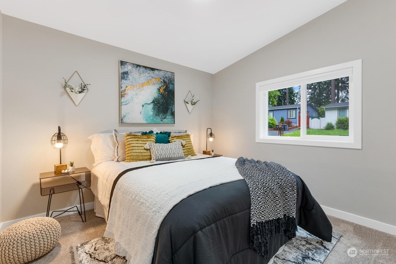 20500 32nd Drive Southeast Bothell, WA 98012 - Photo 18 of 28 a bedroom with a bed and a painting on the wall