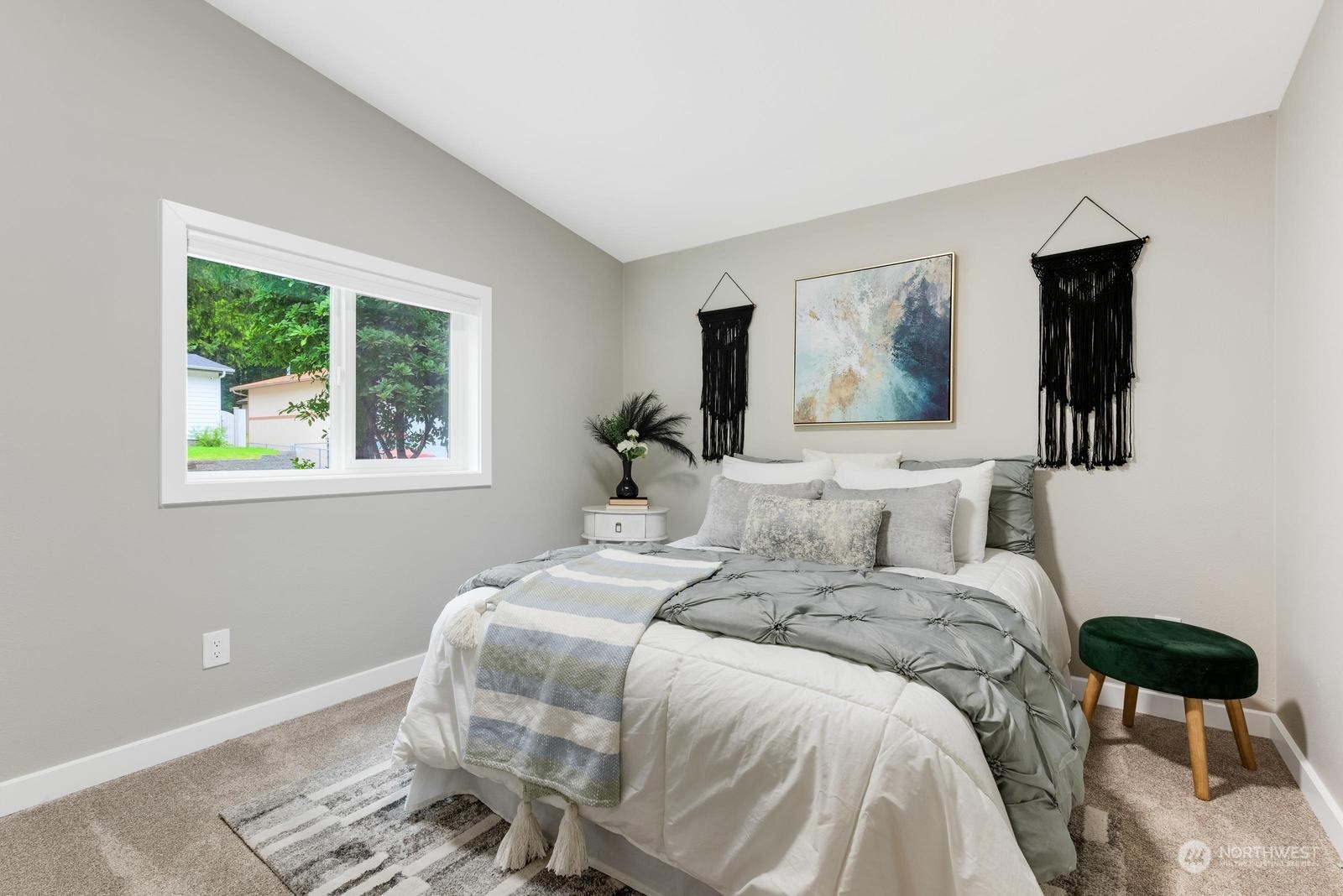 20500 32nd Drive Southeast Bothell, WA 98012 - Photo 19 of 28 a bedroom with a bed and wooden floor