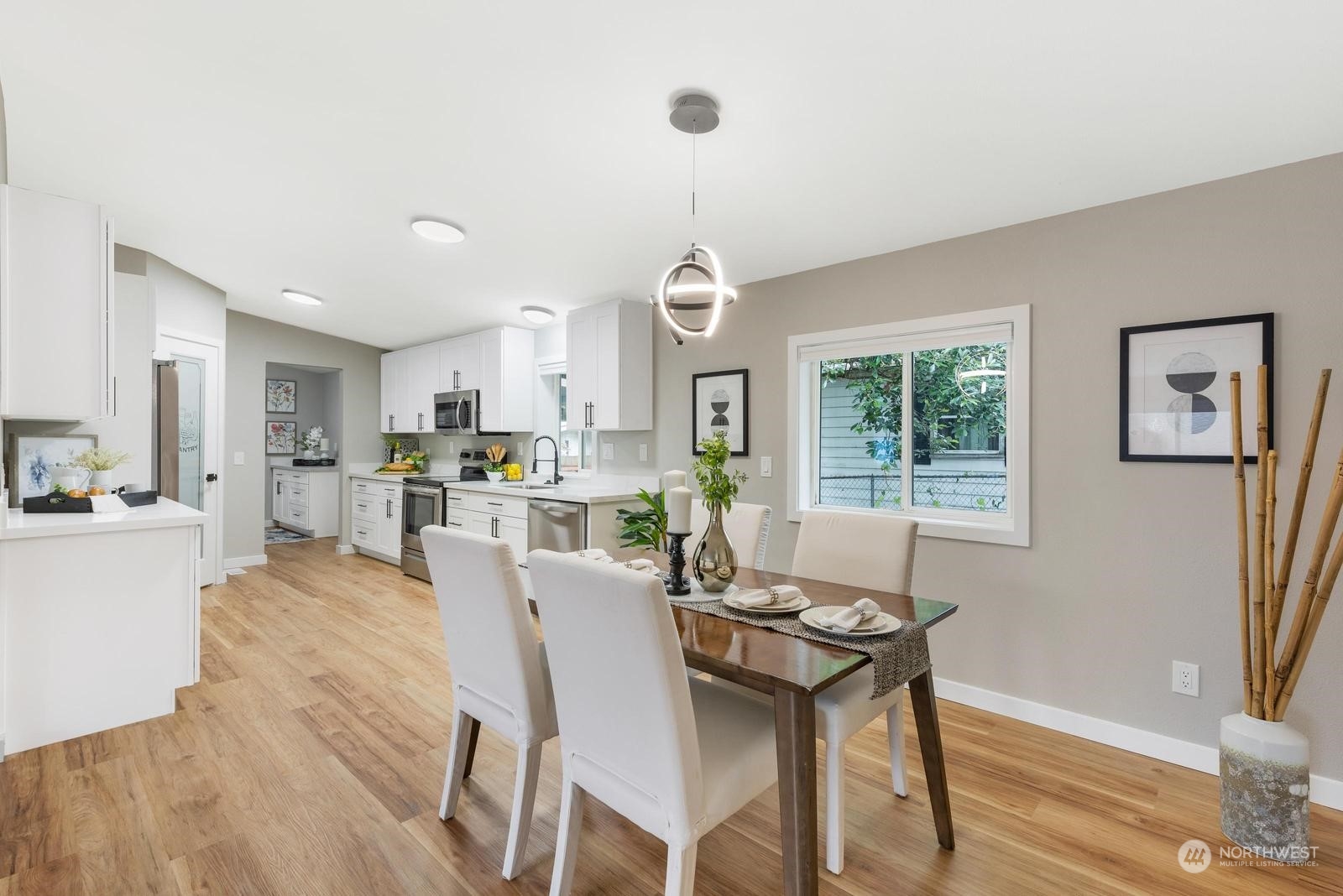 20500 32nd Drive Southeast Bothell, WA 98012 - Photo 8 of 28 a view of a dining room with furniture window and wooden floor
