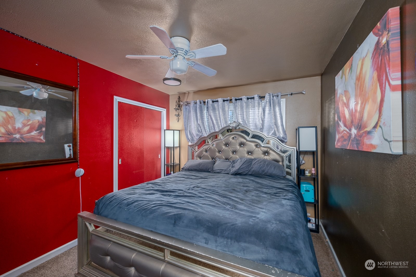 9015 Bong Loop, Unit 9017 Moses Lake, WA 98837 - Photo 16 of 26 a bed sitting in a bedroom next to a window