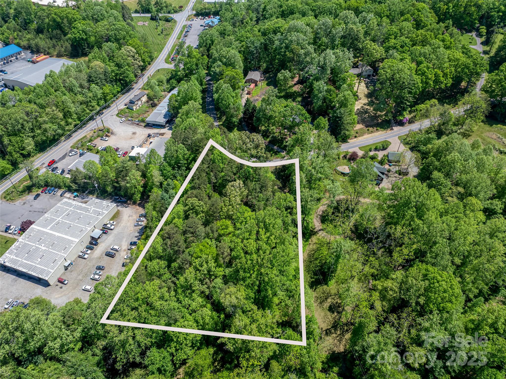 an aerial view of residential house with outdoor space