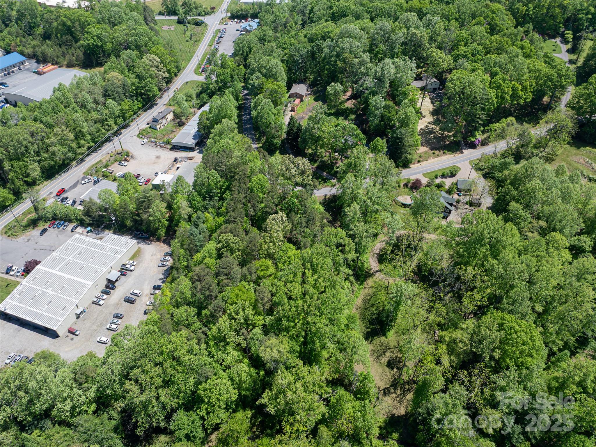 99999 Brevard Road Mills River, NC 28759 - Photo 13 of 13 an aerial view of a house with a yard