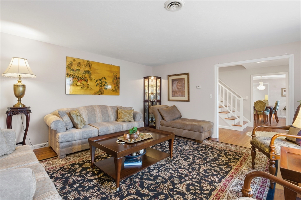 22 Magnolia Road Sharon, MA 02067 - Photo 17 of 42 a living room with furniture and wooden floor