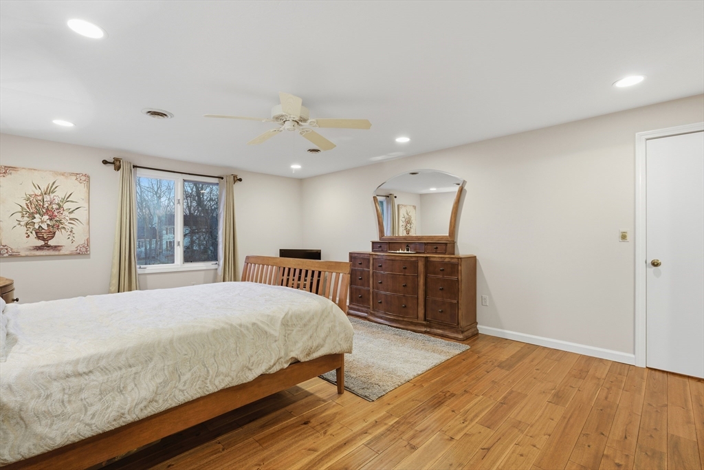 22 Magnolia Road Sharon, MA 02067 - Photo 18 of 42 a bedroom with a bed and a television