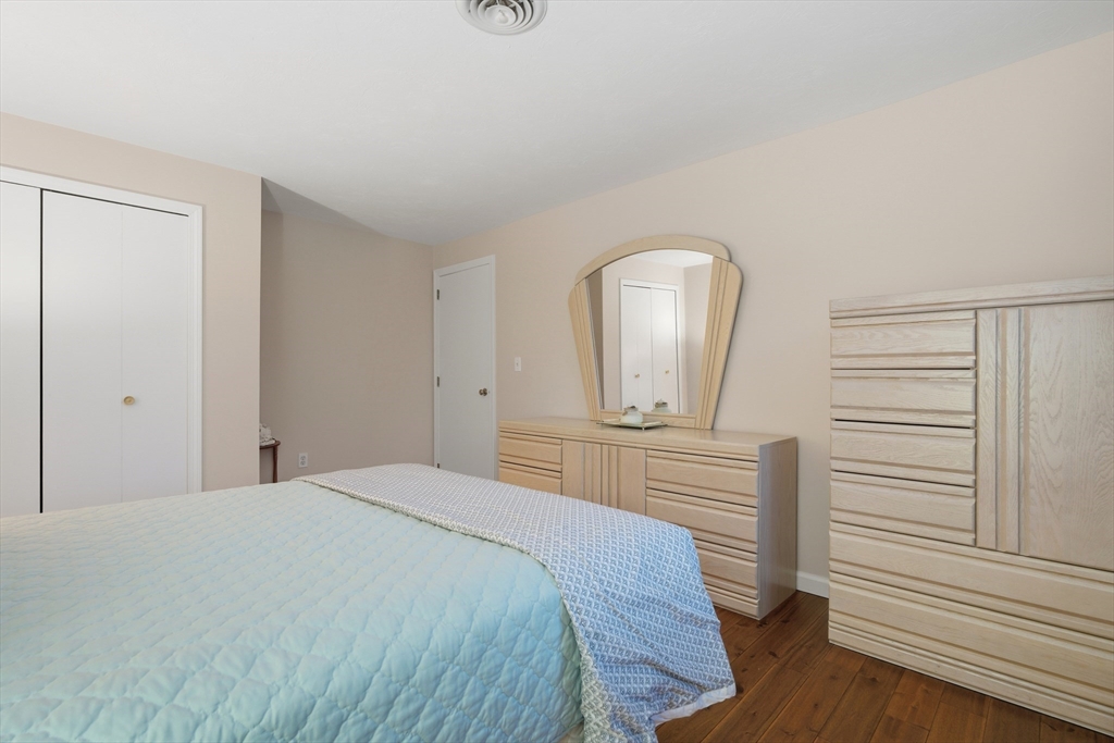 22 Magnolia Road Sharon, MA 02067 - Photo 21 of 42 a bedroom with a bed a dresser and mirror