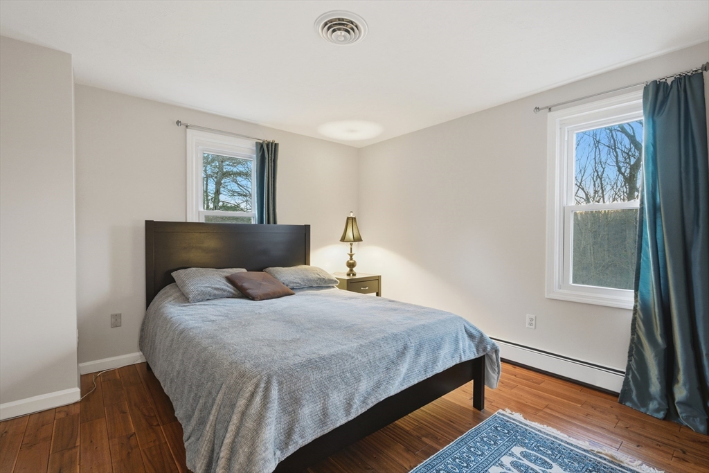 22 Magnolia Road Sharon, MA 02067 - Photo 23 of 42 a bedroom with a bed and a window