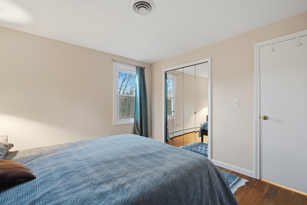 22 Magnolia Road Sharon, MA 02067 - Photo 26 of 42 a bedroom with a bed and a window