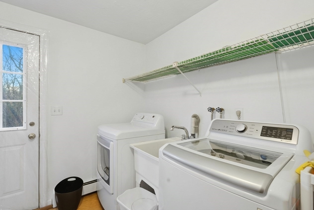 22 Magnolia Road Sharon, MA 02067 - Photo 34 of 42 a utility room with dryer and washer