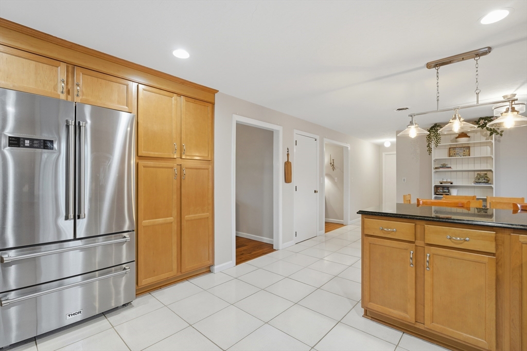 22 Magnolia Road Sharon, MA 02067 - Photo 6 of 42 a kitchen with stainless steel appliances a refrigerator and a sink