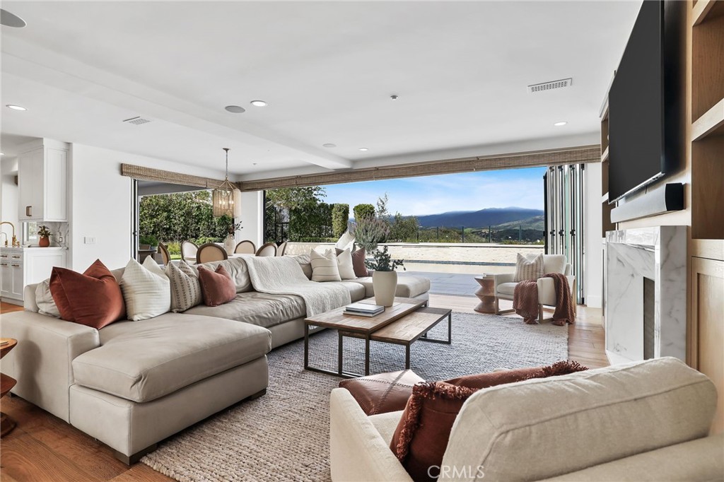 48 Panorama Coto de Caza, CA 92679 - Photo 11 of 66 a living room with furniture and a large window