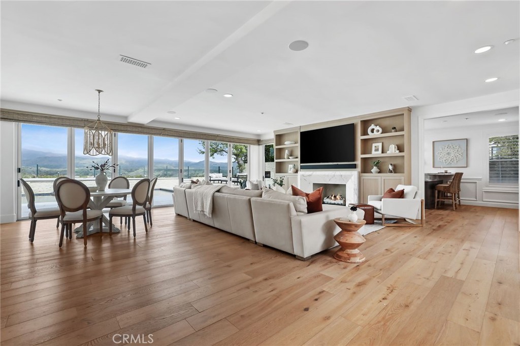 48 Panorama Coto de Caza, CA 92679 - Photo 12 of 66 a living room with furniture flat screen tv and wooden floor