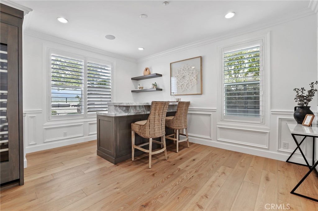 48 Panorama Coto de Caza, CA 92679 - Photo 19 of 66 a dining room with furniture and wooden floor
