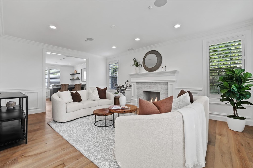 48 Panorama Coto de Caza, CA 92679 - Photo 21 of 66 a living room with furniture a fireplace and potted plants