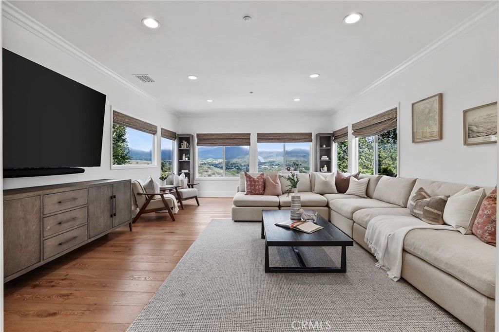 48 Panorama Coto de Caza, CA 92679 - Photo 30 of 66 a living room with furniture and a flat screen tv