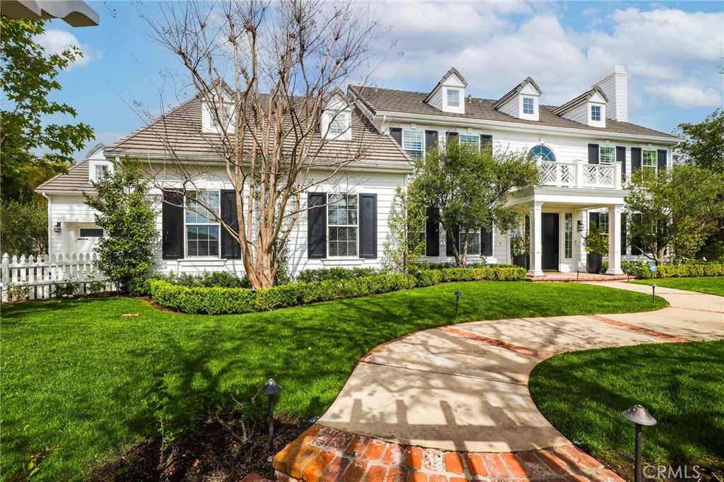 48 Panorama Coto de Caza, CA 92679 - Photo 3 of 66 a view of a white house next to a yard with big trees