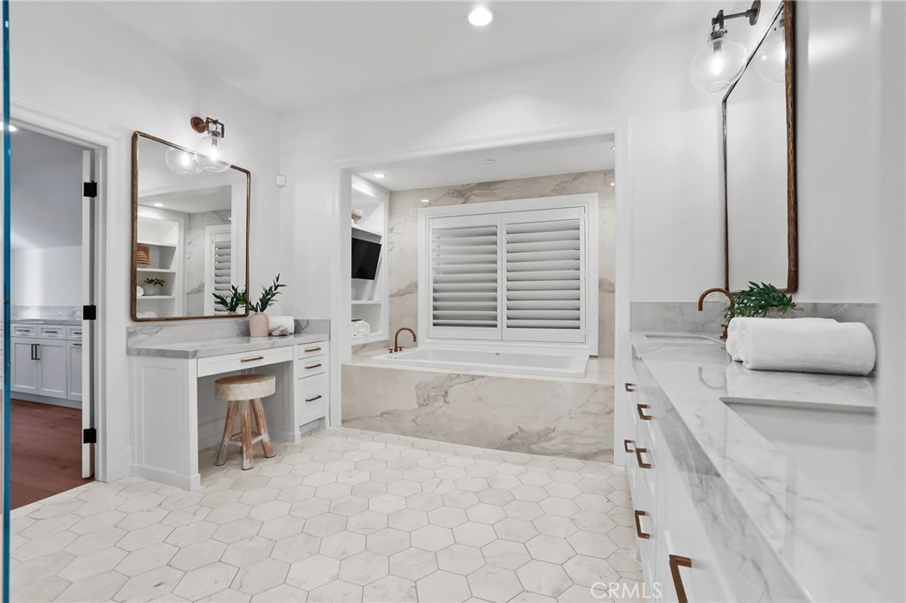 48 Panorama Coto de Caza, CA 92679 - Photo 35 of 66 a spacious bathroom with a granite countertop tub sink and mirror