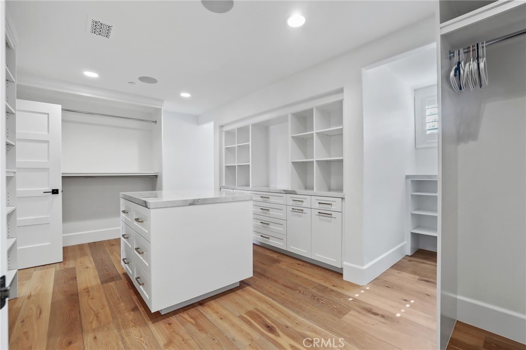 48 Panorama Coto de Caza, CA 92679 - Photo 39 of 66 a kitchen with stainless steel appliances cabinets and wooden floor