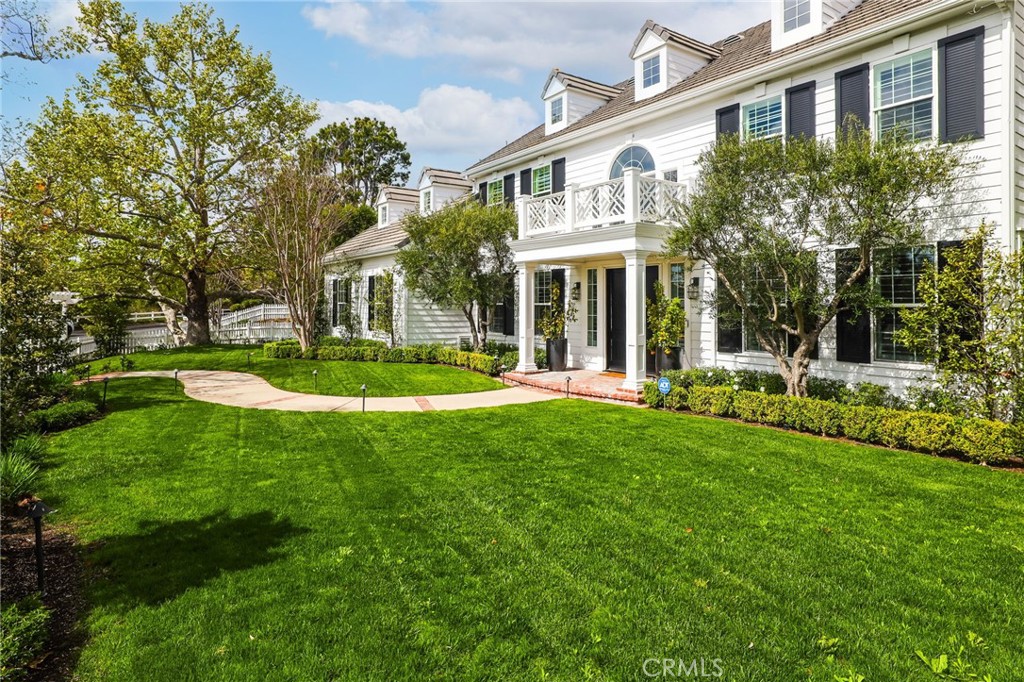 48 Panorama Coto de Caza, CA 92679 - Photo 4 of 66 a front view of a house with a yard and green space