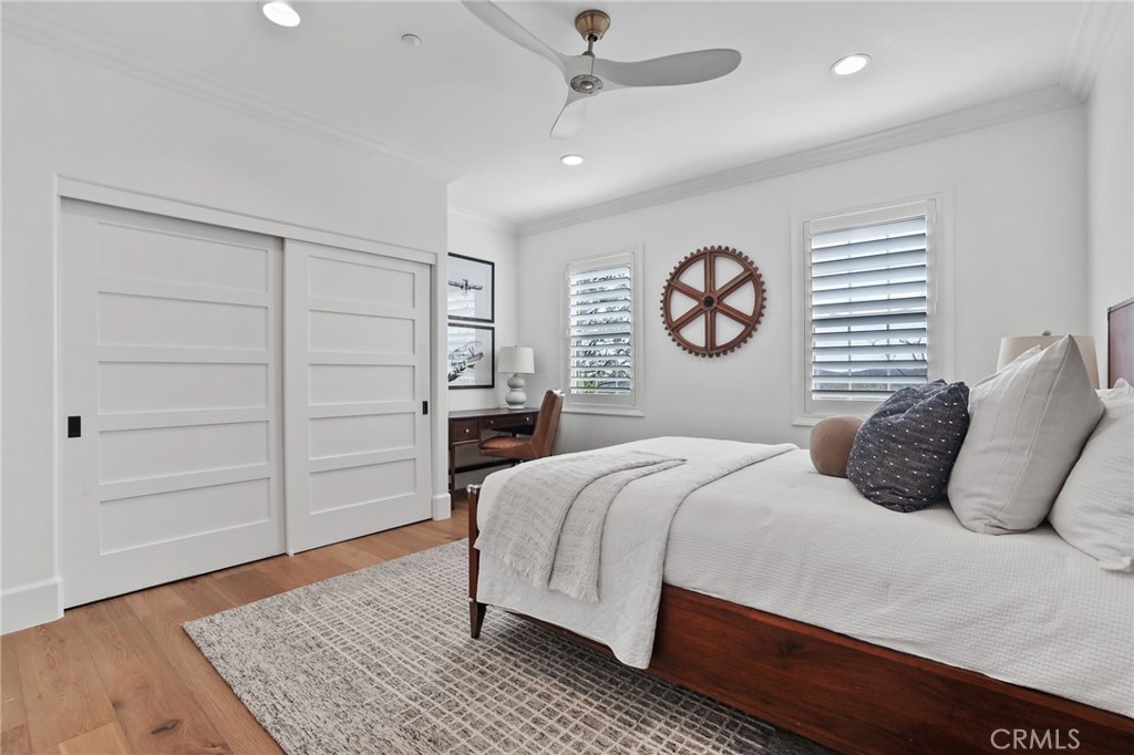 48 Panorama Coto de Caza, CA 92679 - Photo 42 of 66 a bedroom with a large bed and a chandelier