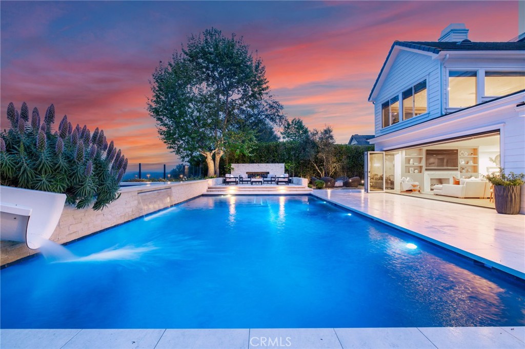 48 Panorama Coto de Caza, CA 92679 - Photo 54 of 66 a swimming pool with outdoor seating and yard in the back