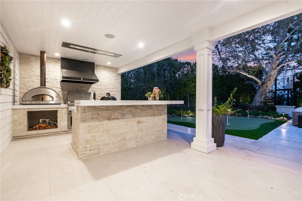 48 Panorama Coto de Caza, CA 92679 - Photo 63 of 66 a kitchen with stainless steel appliances kitchen island granite countertop a stove and a sink