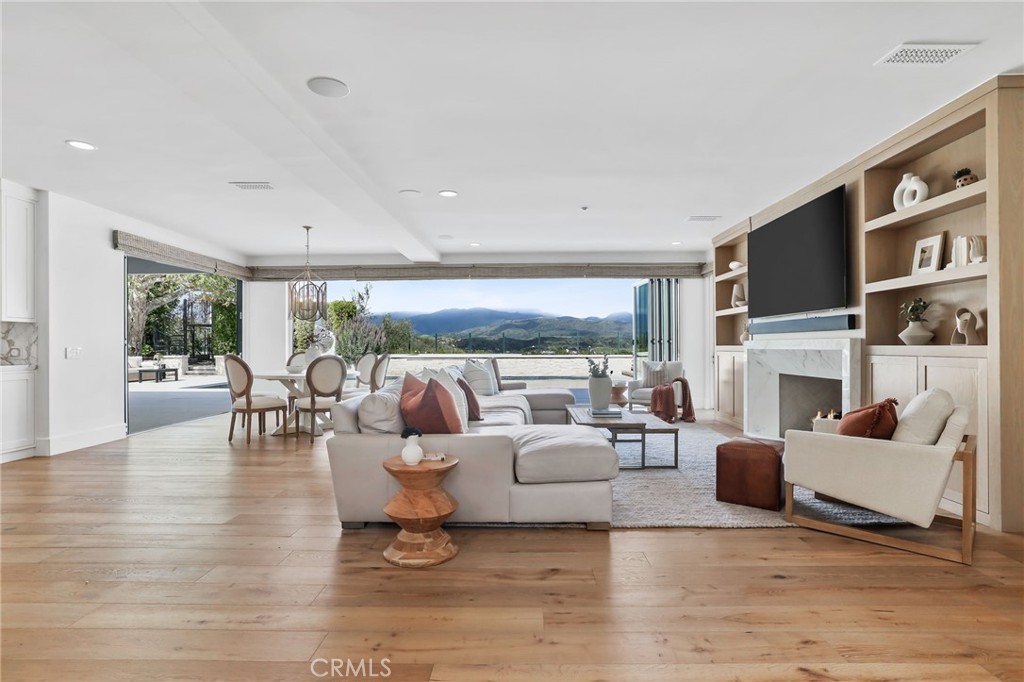 48 Panorama Coto de Caza, CA 92679 - Photo 8 of 66 a living room with fireplace furniture and a large window