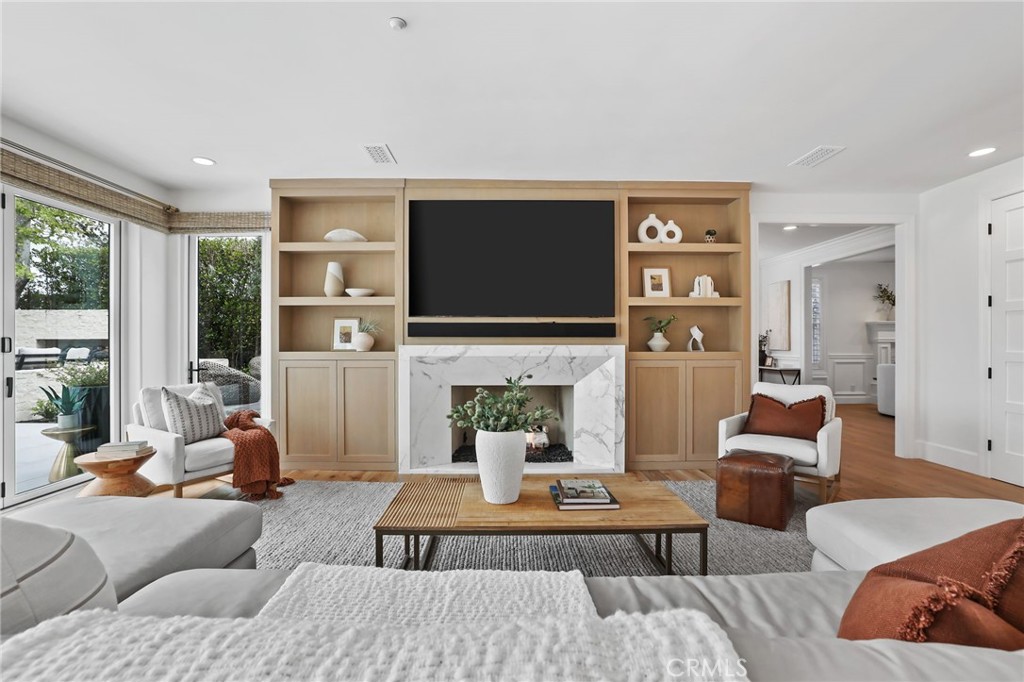 48 Panorama Coto de Caza, CA 92679 - Photo 9 of 66 a living room with furniture a fireplace and a flat screen tv