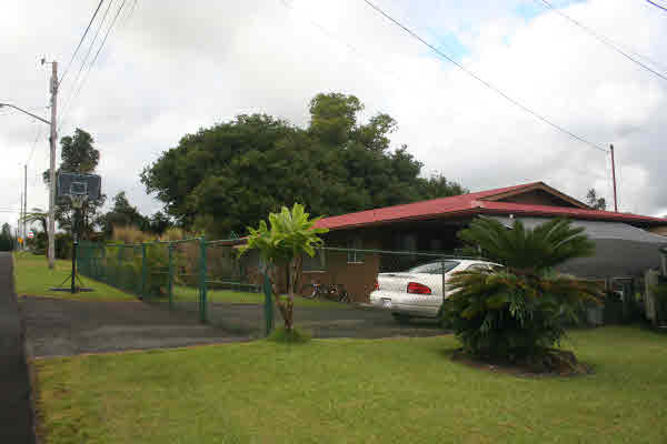 18-7858 Henele Road Mountain View, HI 96771 - Photo 3 of 24 a cars parked in front of a house