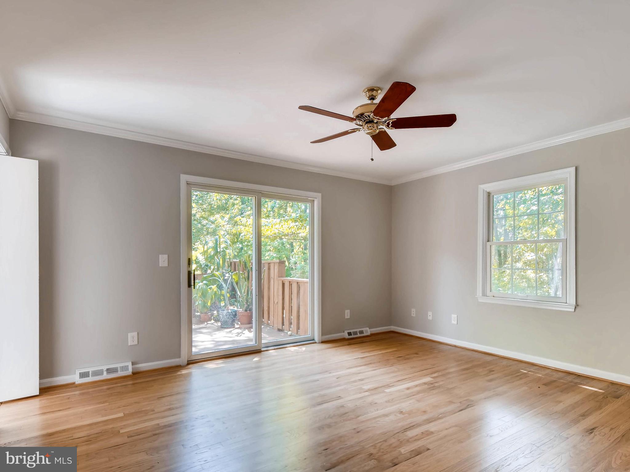 13701 Bardon Road Phoenix, MD 21131 - Photo 14 of 30 a view of a livingroom with a ceiling fan and window