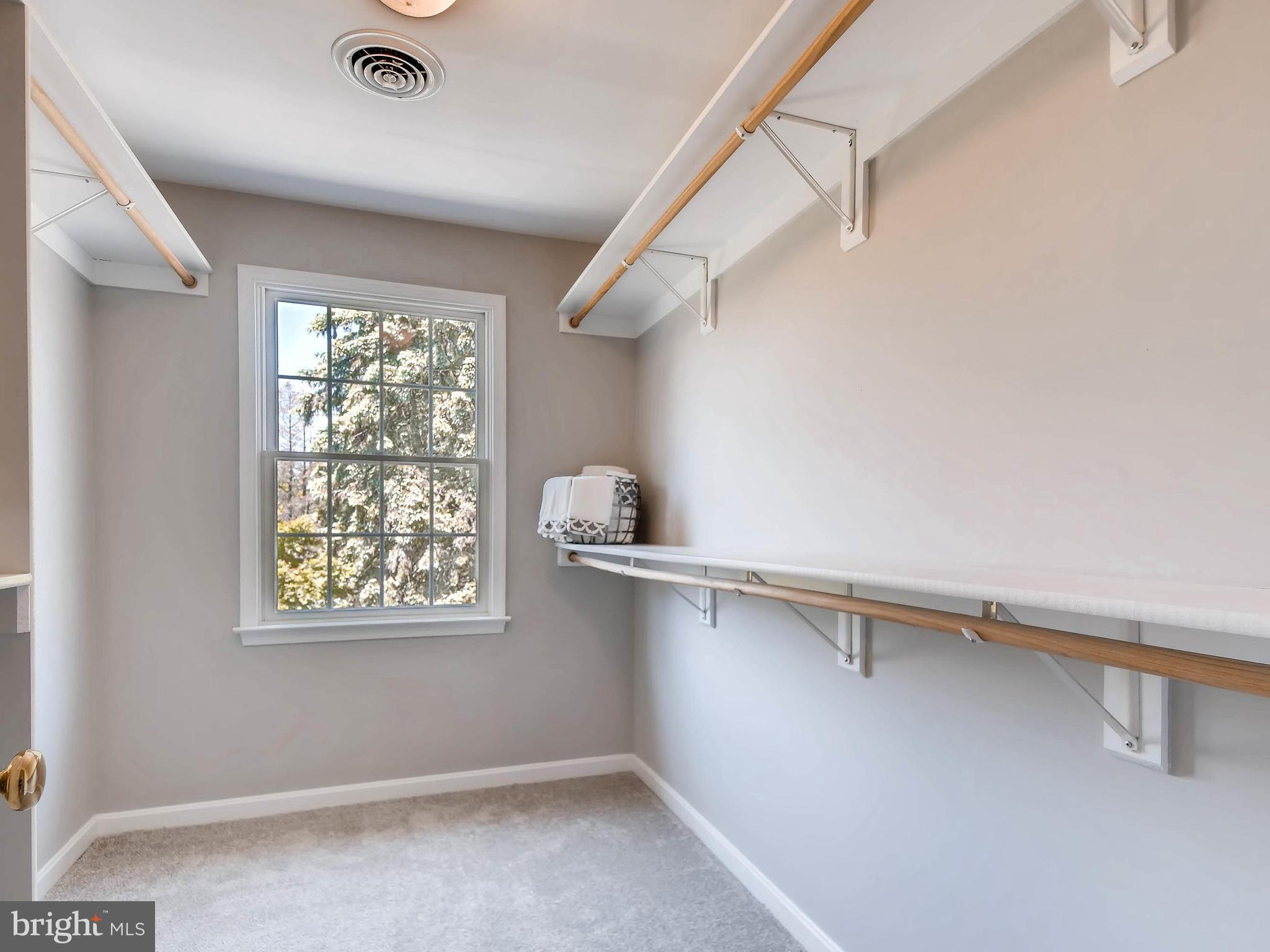13701 Bardon Road Phoenix, MD 21131 - Photo 22 of 30 a view of storage and utility room with racks on the wall