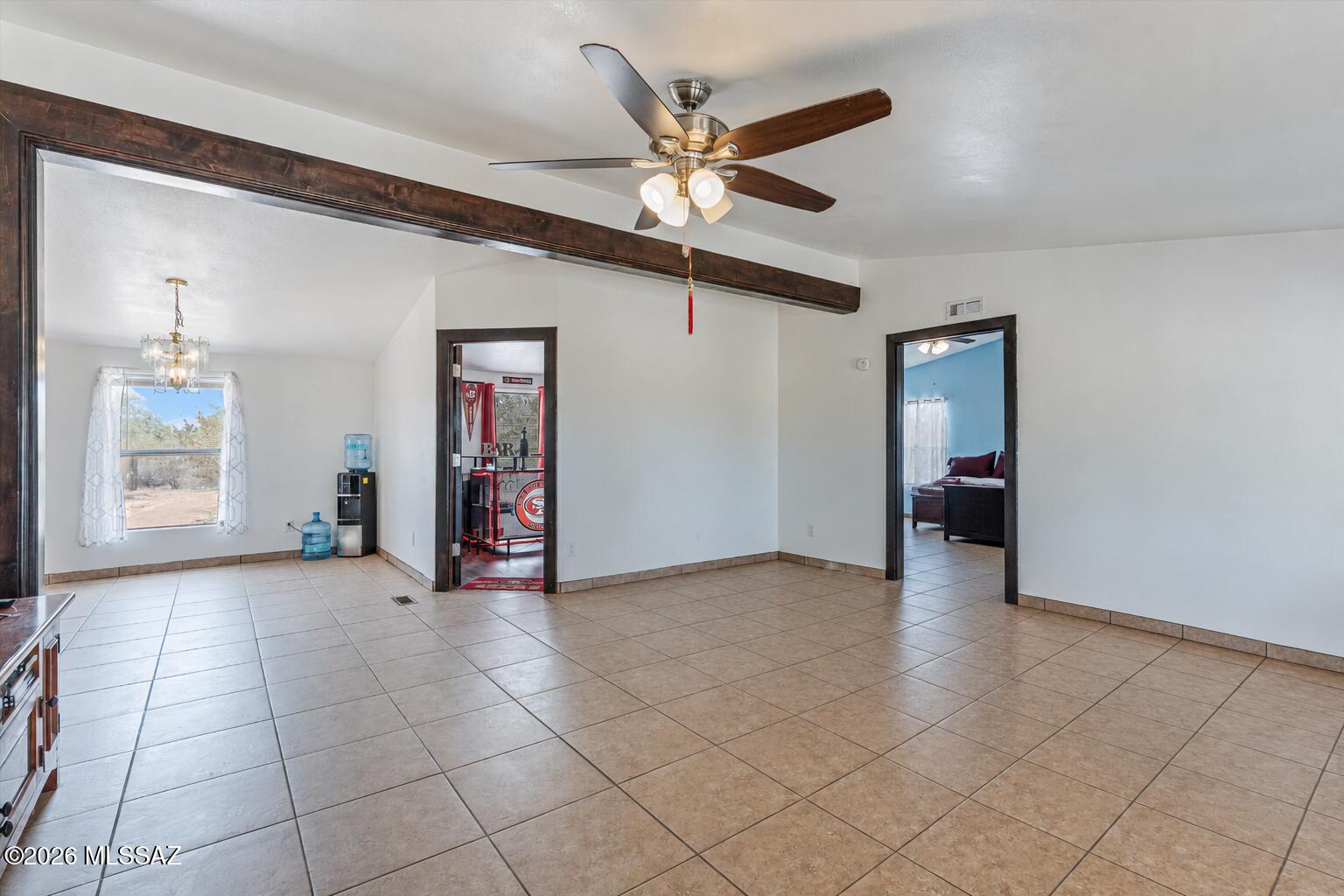 10935 South Swan Road Tucson, AZ 85756 - Photo 8 of 41 Living room flows seamlessly into into dining