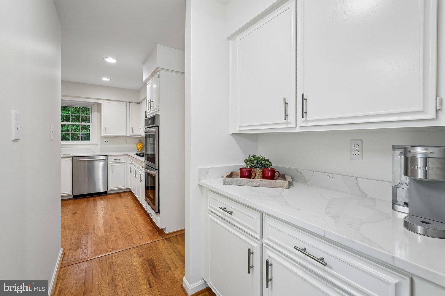 11732 Stuart Mill Road Oakton, VA 22124 - Photo 11 of 79 Butler's Pantry with Quartz Countertops.