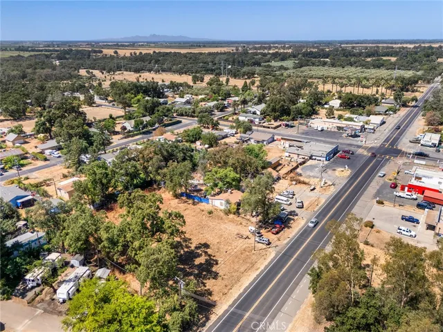an aerial view of city and lake