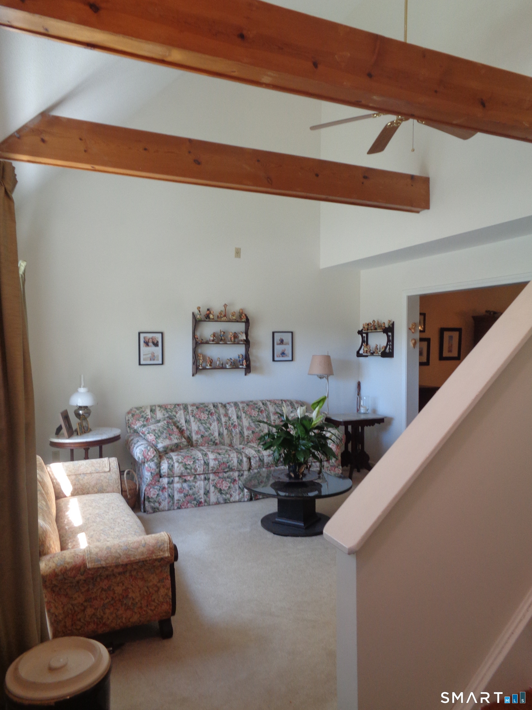 321 Spring Street Naugatuck, CT 06770 - Photo 6 of 27 a living room with furniture and flowers