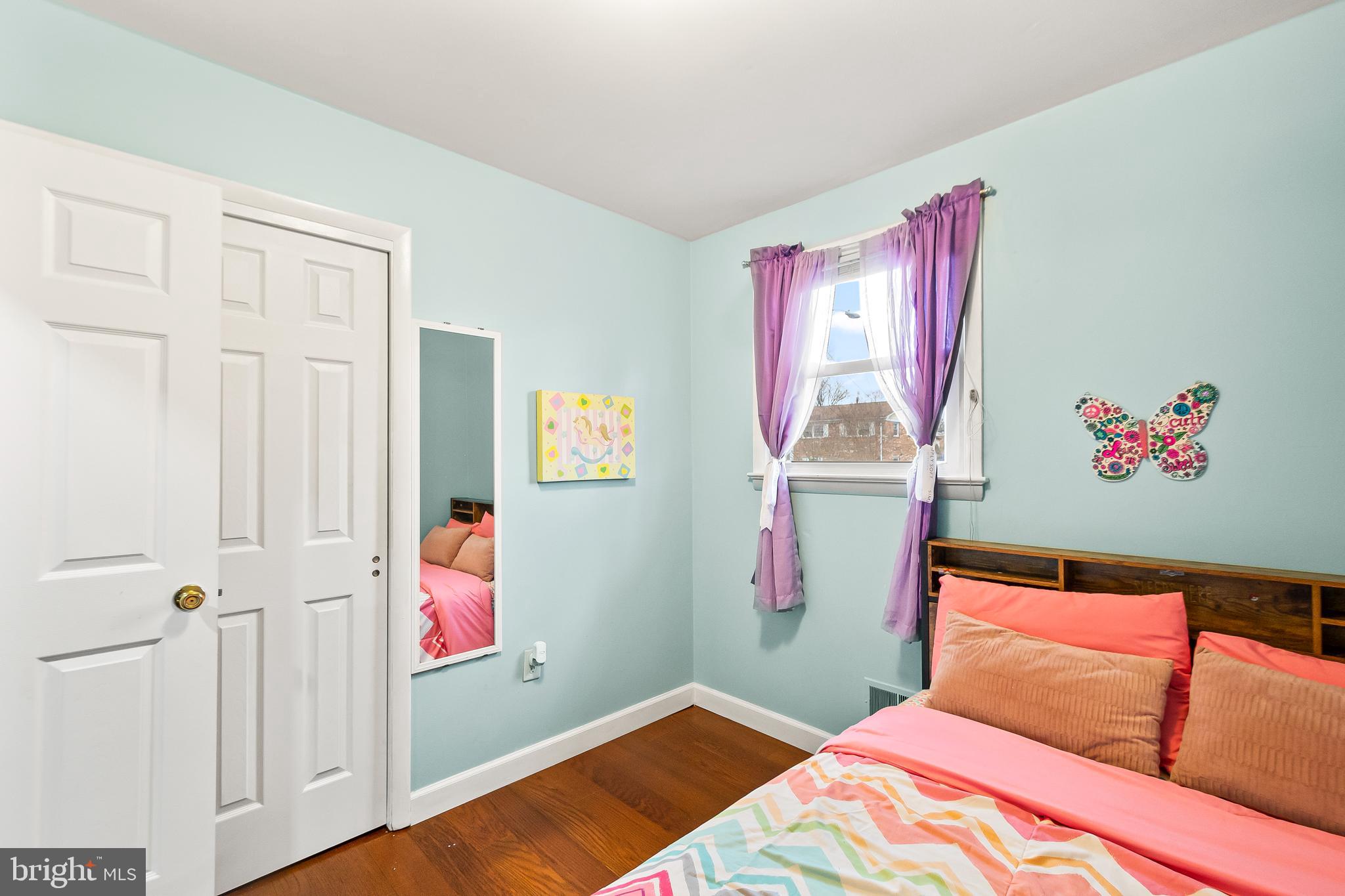 11411 Hermitt Street Clinton, MD 20735 - Photo 17 of 40 a bedroom with a bed and a window