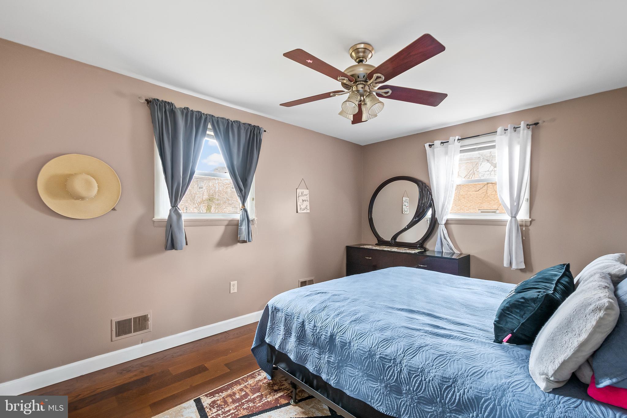 11411 Hermitt Street Clinton, MD 20735 - Photo 20 of 40 a bedroom with a bed and a window