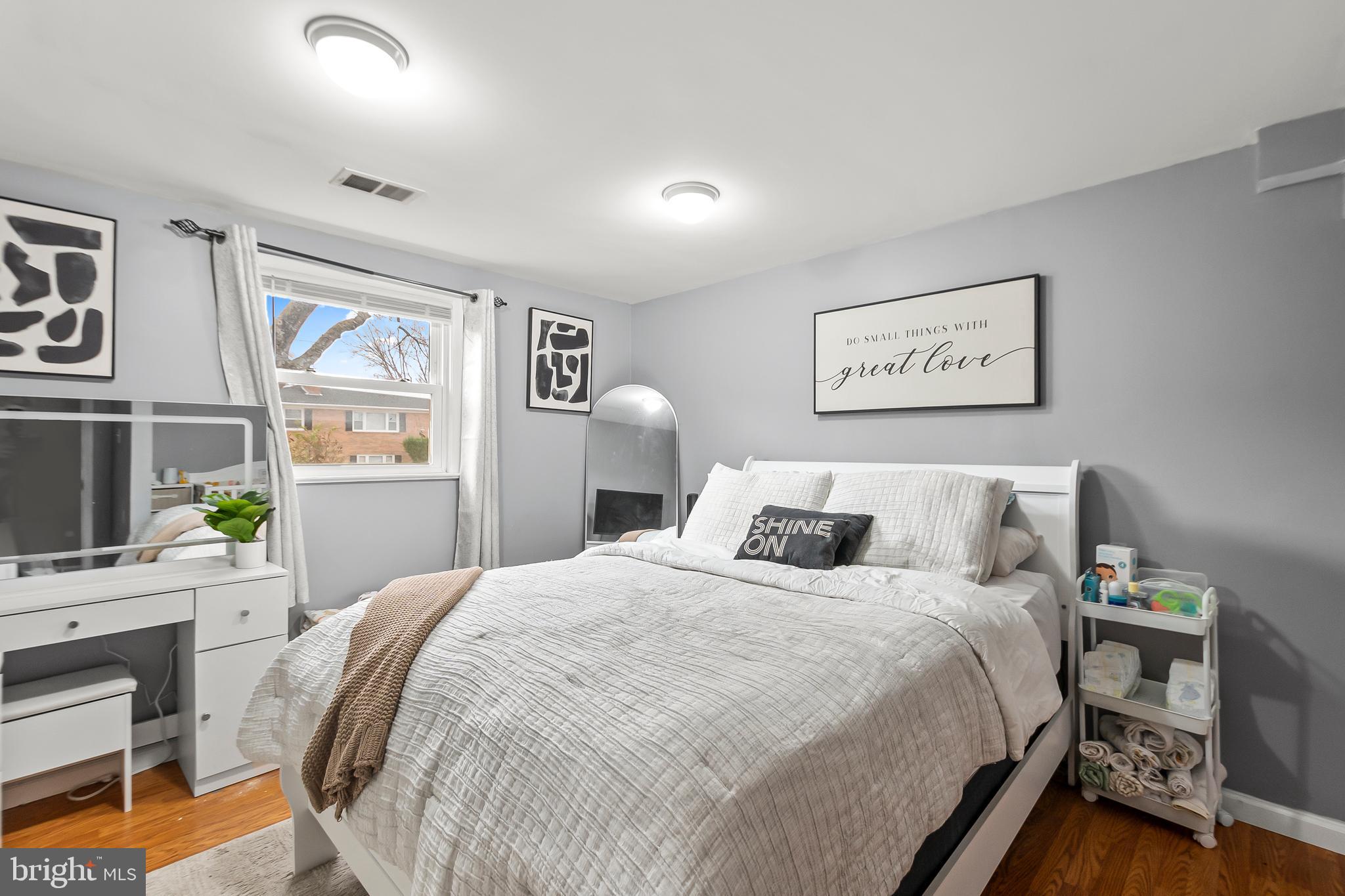 11411 Hermitt Street Clinton, MD 20735 - Photo 31 of 40 a bedroom with a bed and a desk