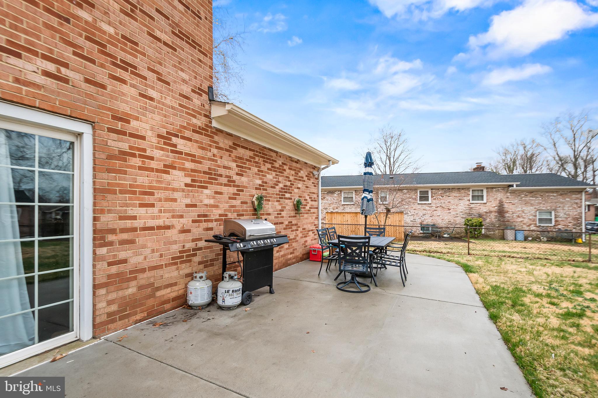 11411 Hermitt Street Clinton, MD 20735 - Photo 37 of 40 a view of a patio with table and chairs