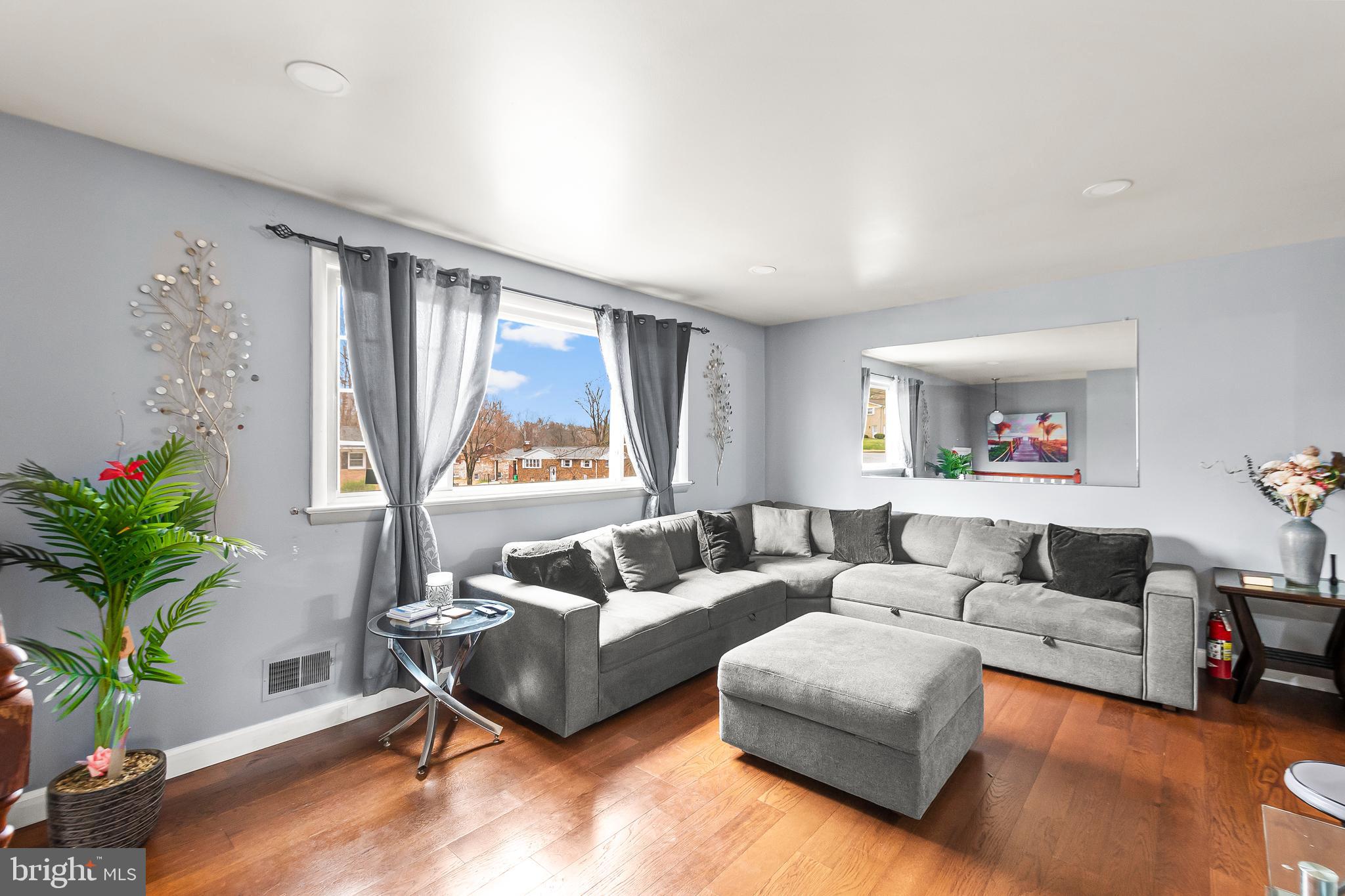 11411 Hermitt Street Clinton, MD 20735 - Photo 6 of 40 a living room with furniture and a large window