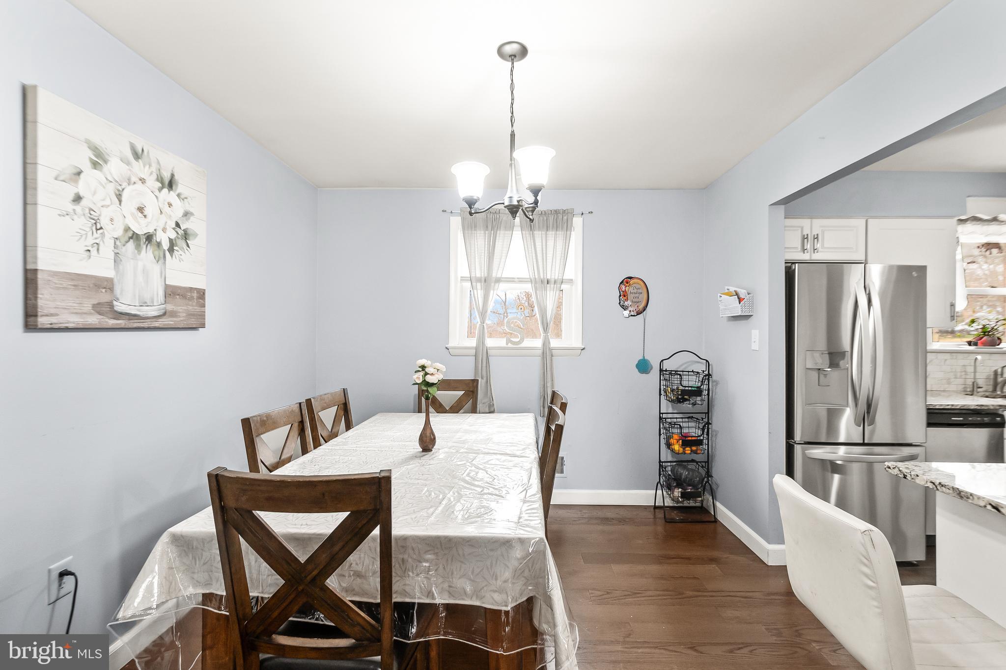 11411 Hermitt Street Clinton, MD 20735 - Photo 9 of 40 a view of a dining room with furniture window and outside view