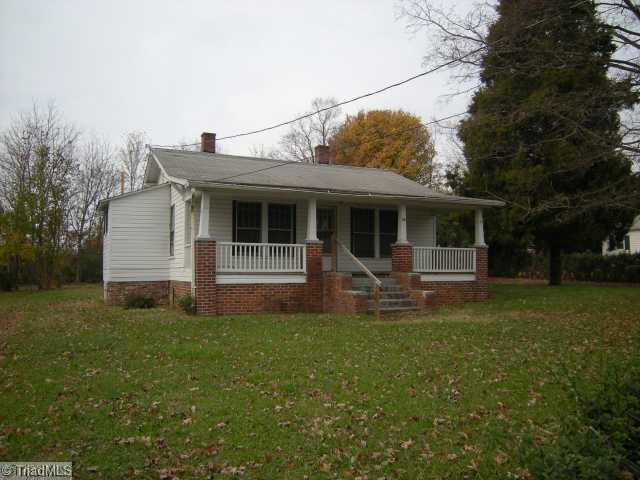 Exterior Front. Older home in need of repair. Has been rental property for many years.