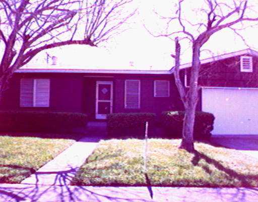 a view of a house with a snow yard