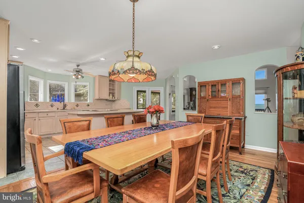 a living room with a flat screen tv and a fireplace