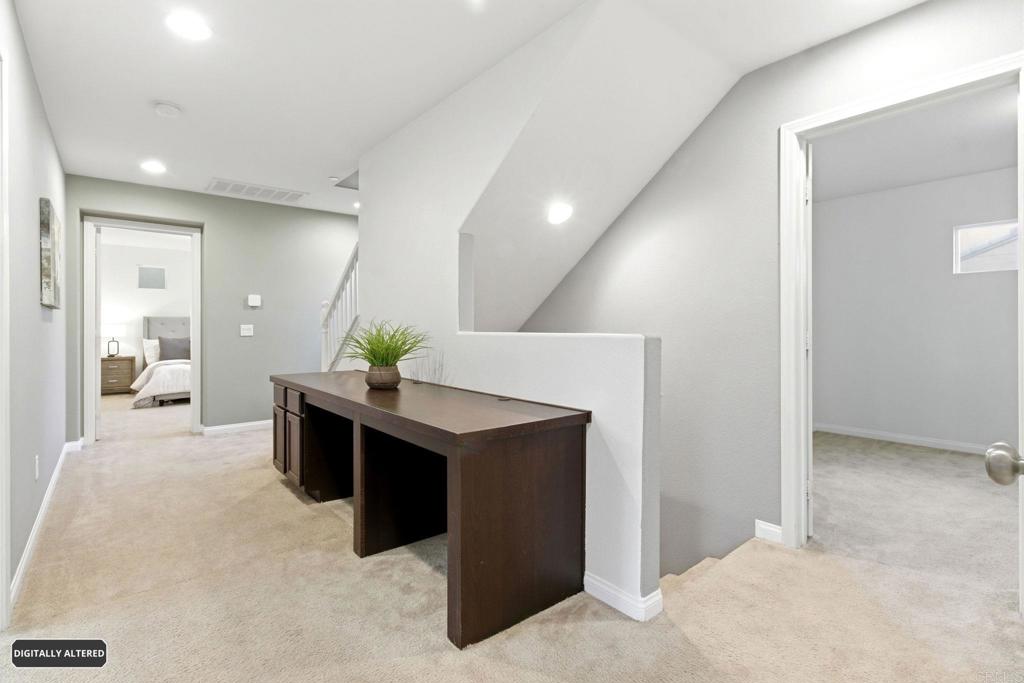1508 Carpinteria Street Chula Vista, CA 91913 - Photo 18 of 39 a view of a hallway with cabinet and a couch