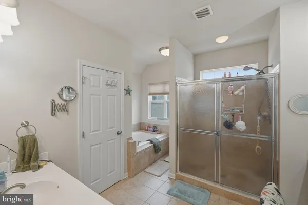 a bathroom with a shower and toilet